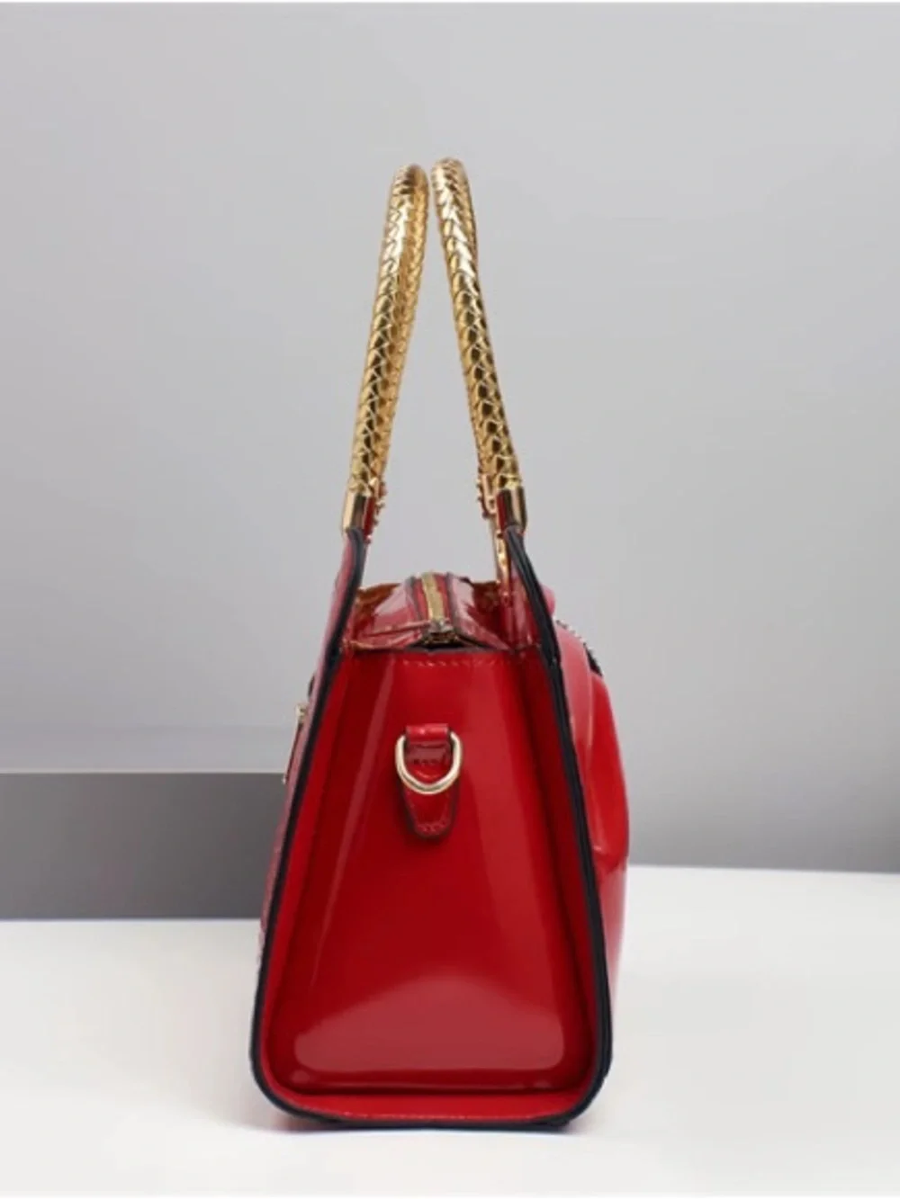 Elegant Red Patent Bow Handbag with Gold Handles